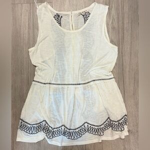 Chic White Sleeveless Blouse with Black Detailing